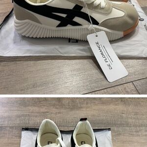 Black and White Sneakers with Thick Sole and Sleek Design